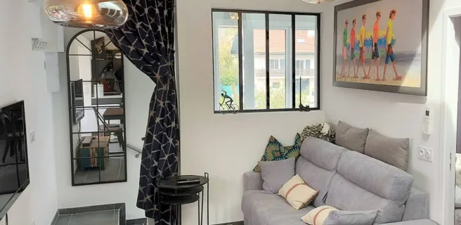 Salon / Séjour avec canapé convertible et télévision